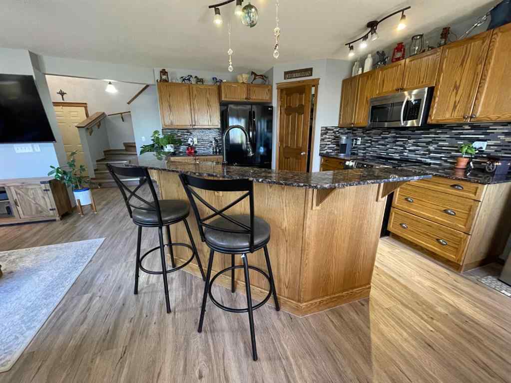 MLS® A2265166 - 63 Glensummit Close  in GlenEagles Cochrane, Residential