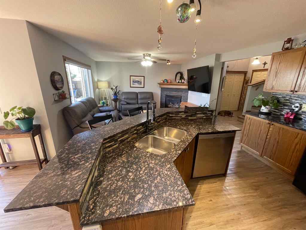 MLS® A2265166 - 63 Glensummit Close  in GlenEagles Cochrane, Residential