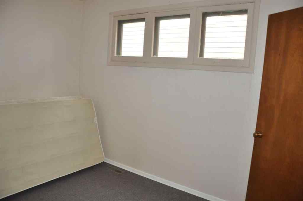 MLS® A2265180 - 1607 10 Avenue S in Victoria Park Lethbridge, Residential