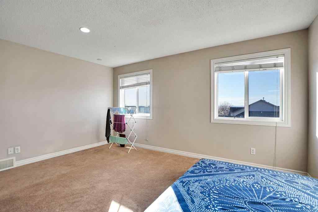 MLS® A2265182 - 3 Saddleland Crescent NE in Saddle Ridge Calgary, Residential