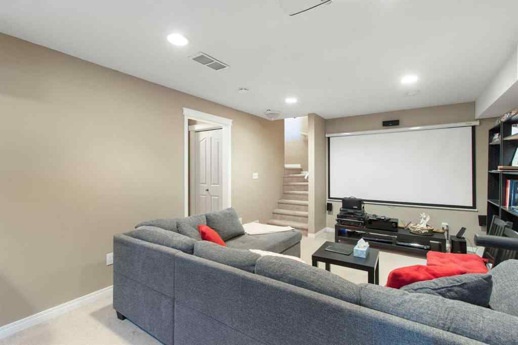 MLS® A2265193 - 38 Spring Crescent SW in Springbank Hill Calgary, Residential