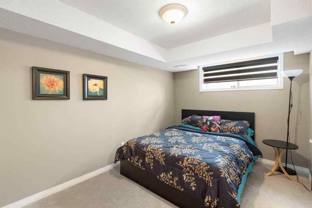 MLS® A2265193 - 38 Spring Crescent SW in Springbank Hill Calgary, Residential