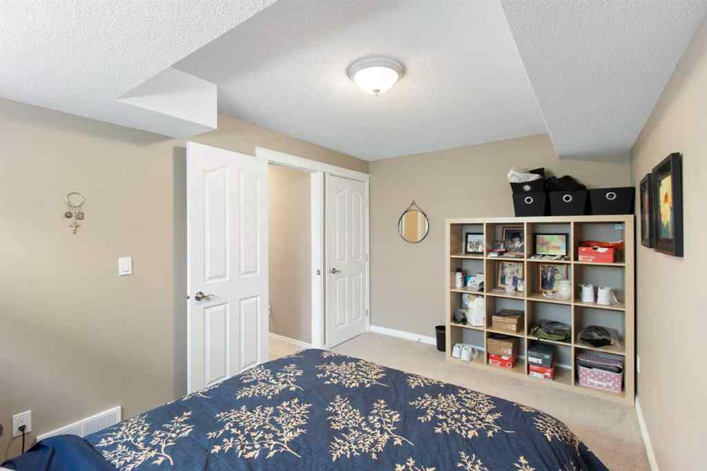 MLS® A2265193 - 38 Spring Crescent SW in Springbank Hill Calgary, Residential