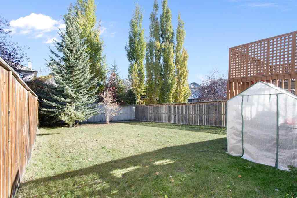 MLS® A2265193 - 38 Spring Crescent SW in Springbank Hill Calgary, Residential