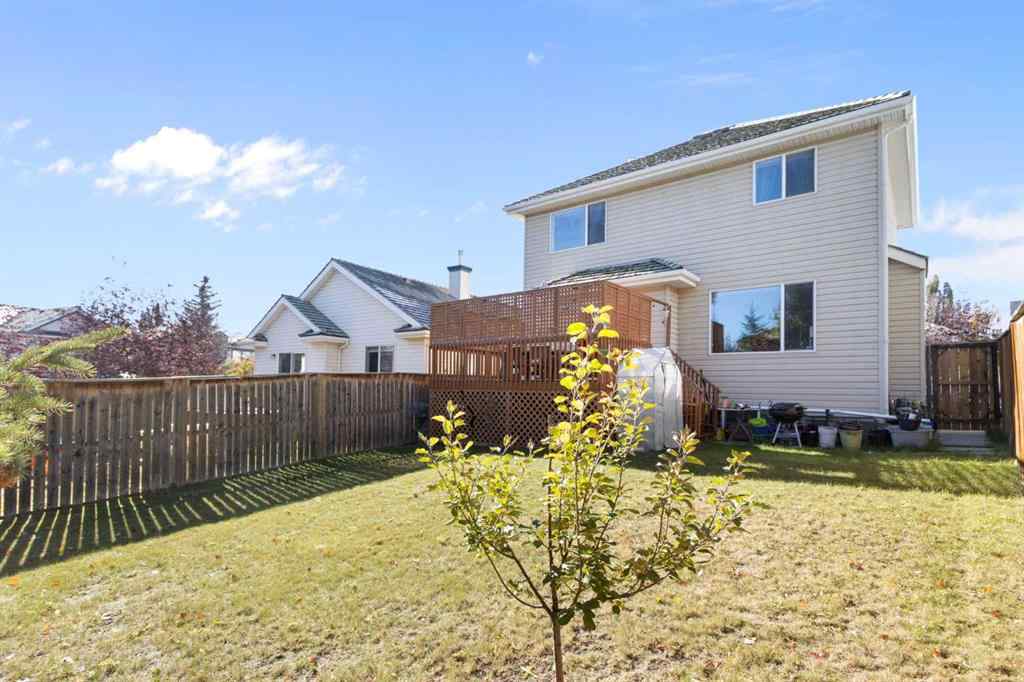 MLS® A2265193 - 38 Spring Crescent SW in Springbank Hill Calgary, Residential