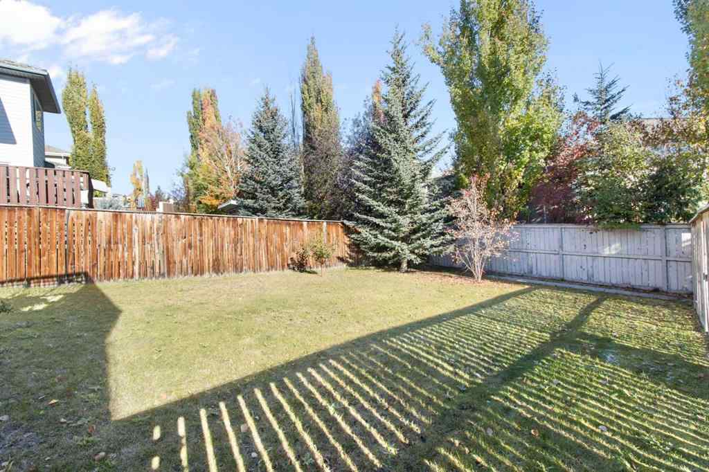 MLS® A2265193 - 38 Spring Crescent SW in Springbank Hill Calgary, Residential