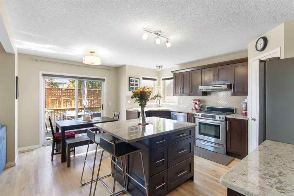 MLS® A2265193 - 38 Spring Crescent SW in Springbank Hill Calgary, Residential