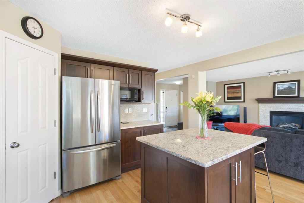 MLS® A2265193 - 38 Spring Crescent SW in Springbank Hill Calgary, Residential