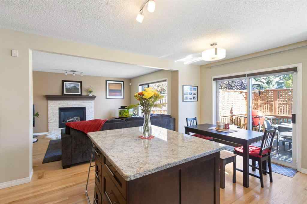 MLS® A2265193 - 38 Spring Crescent SW in Springbank Hill Calgary, Residential