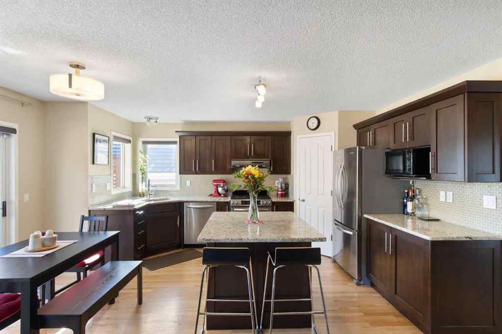 MLS® A2265193 - 38 Spring Crescent SW in Springbank Hill Calgary, Residential