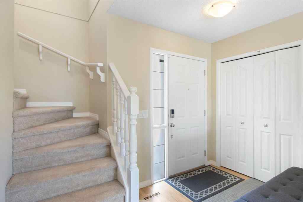 MLS® A2265193 - 38 Spring Crescent SW in Springbank Hill Calgary, Residential
