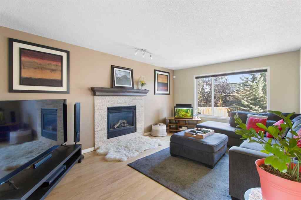 MLS® A2265193 - 38 Spring Crescent SW in Springbank Hill Calgary, Residential