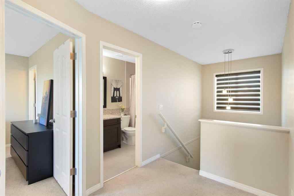 MLS® A2265193 - 38 Spring Crescent SW in Springbank Hill Calgary, Residential