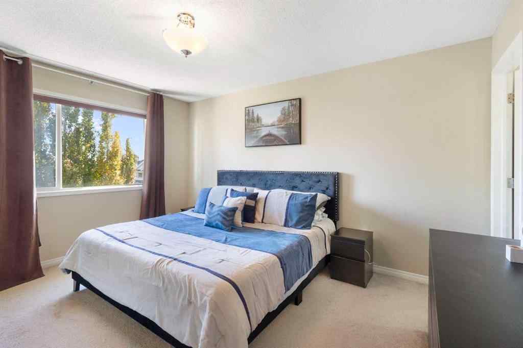 MLS® A2265193 - 38 Spring Crescent SW in Springbank Hill Calgary, Residential