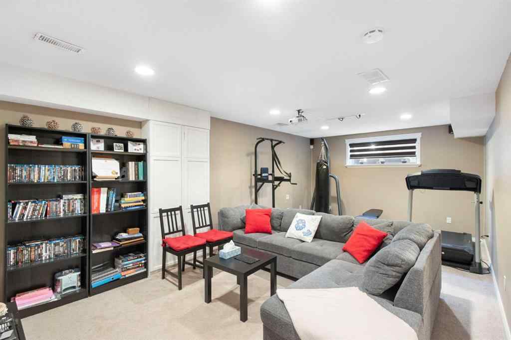 MLS® A2265193 - 38 Spring Crescent SW in Springbank Hill Calgary, Residential