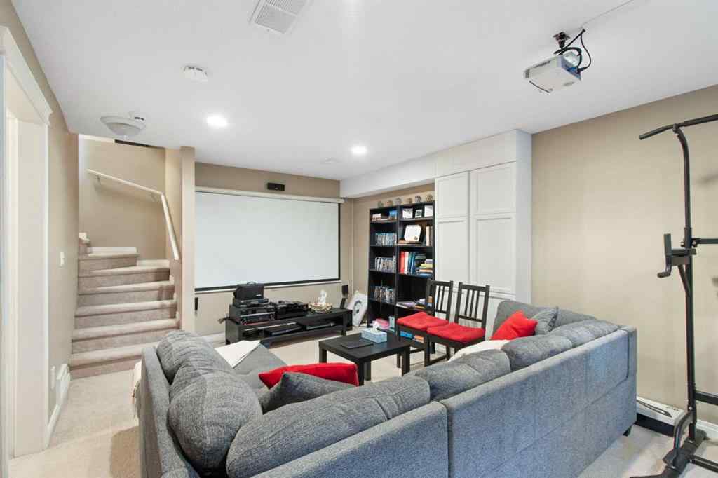 MLS® A2265193 - 38 Spring Crescent SW in Springbank Hill Calgary, Residential