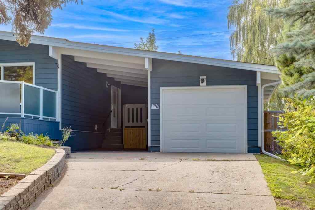 MLS® A2265208 - 911 80 Avenue SW in Chinook Park Calgary, Residential