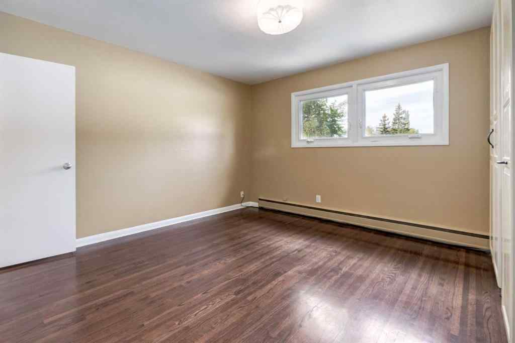MLS® A2265208 - 911 80 Avenue SW in Chinook Park Calgary, Residential