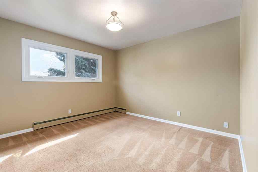 MLS® A2265208 - 911 80 Avenue SW in Chinook Park Calgary, Residential