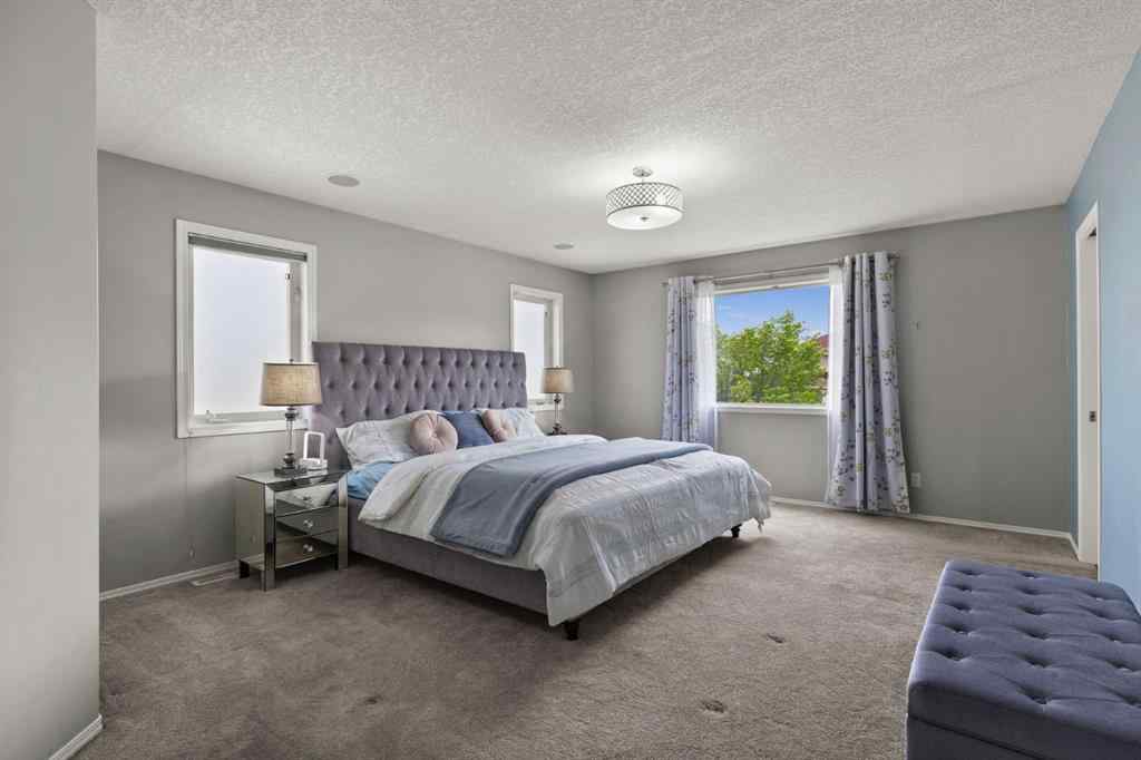 MLS® A2265209 - 38 Simcoe Crescent SW in Signal Hill Calgary, Residential