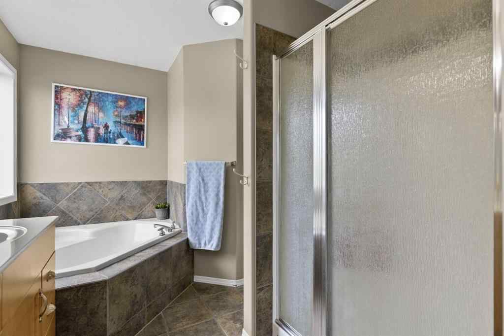 MLS® A2265209 - 38 Simcoe Crescent SW in Signal Hill Calgary, Residential