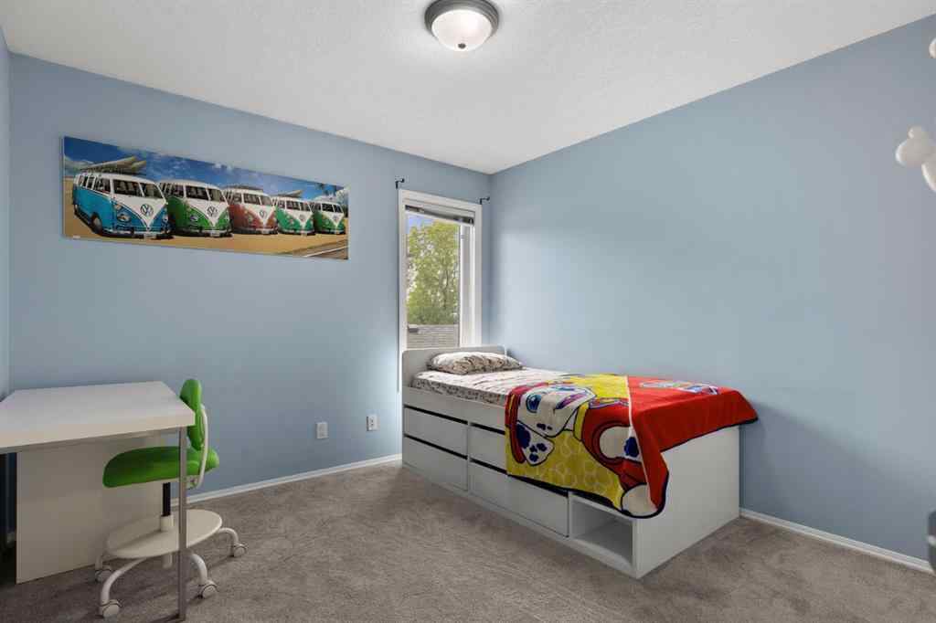 MLS® A2265209 - 38 Simcoe Crescent SW in Signal Hill Calgary, Residential