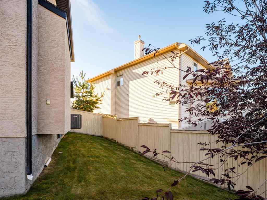 MLS® A2265209 - 38 Simcoe Crescent SW in Signal Hill Calgary, Residential