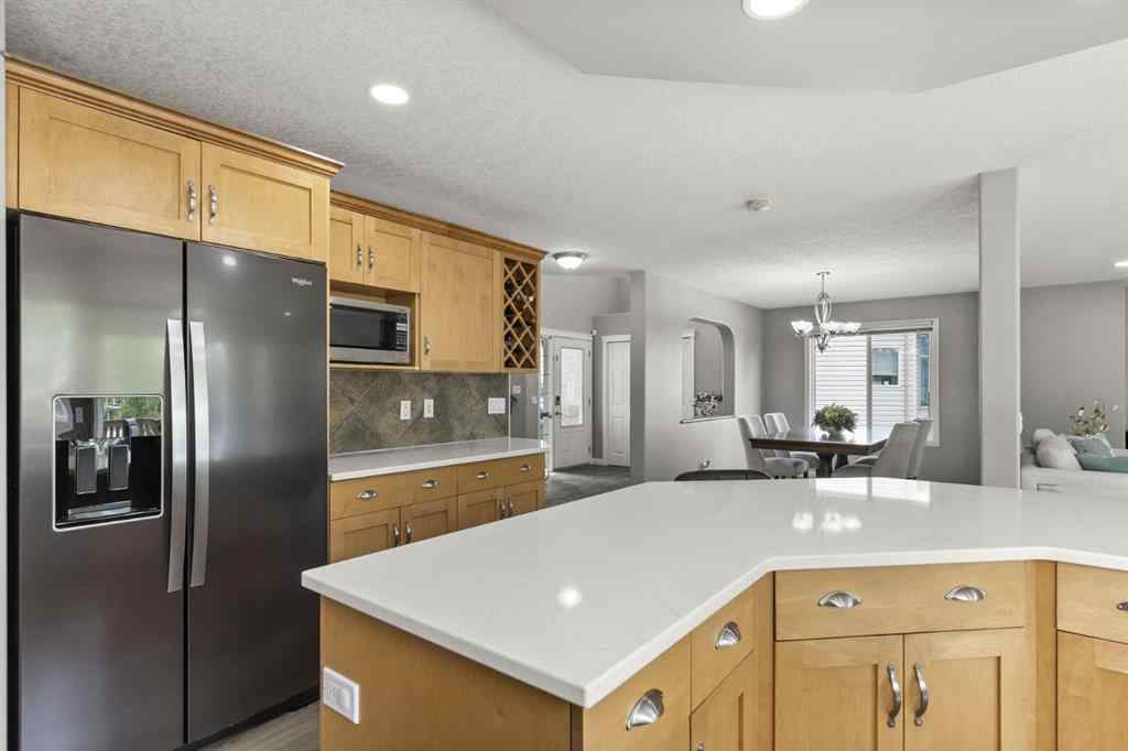 MLS® A2265209 - 38 Simcoe Crescent SW in Signal Hill Calgary, Residential