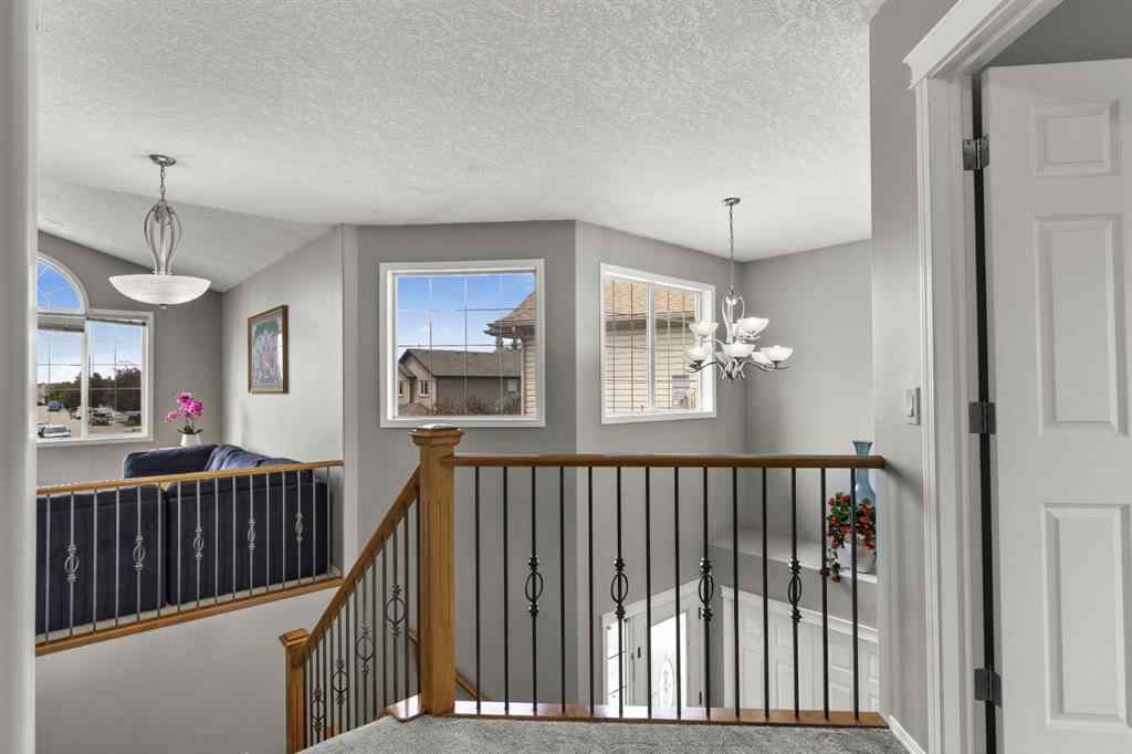 MLS® A2265209 - 38 Simcoe Crescent SW in Signal Hill Calgary, Residential