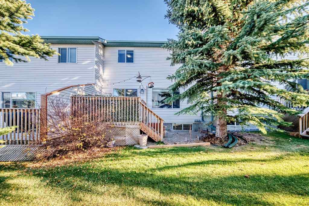MLS® A2265241 - Unit #8 122 Bow Ridge Crescent  in Bow Ridge Cochrane, Residential