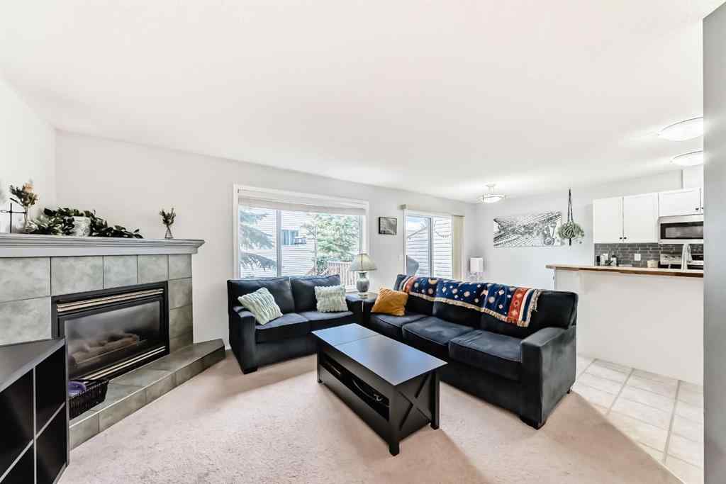 MLS® A2265241 - Unit #8 122 Bow Ridge Crescent  in Bow Ridge Cochrane, Residential