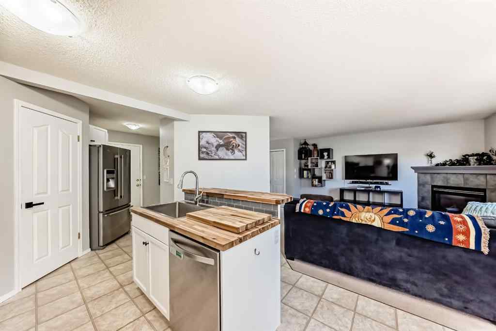 MLS® A2265241 - Unit #8 122 Bow Ridge Crescent  in Bow Ridge Cochrane, Residential