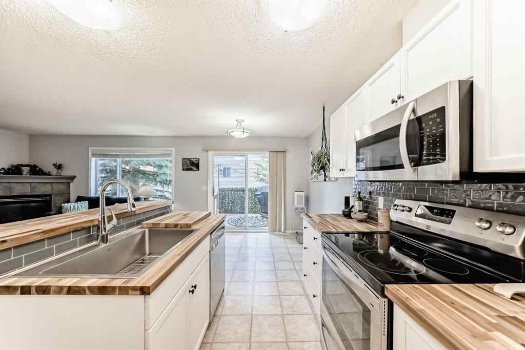 MLS® A2265241 - Unit #8 122 Bow Ridge Crescent  in Bow Ridge Cochrane, Residential