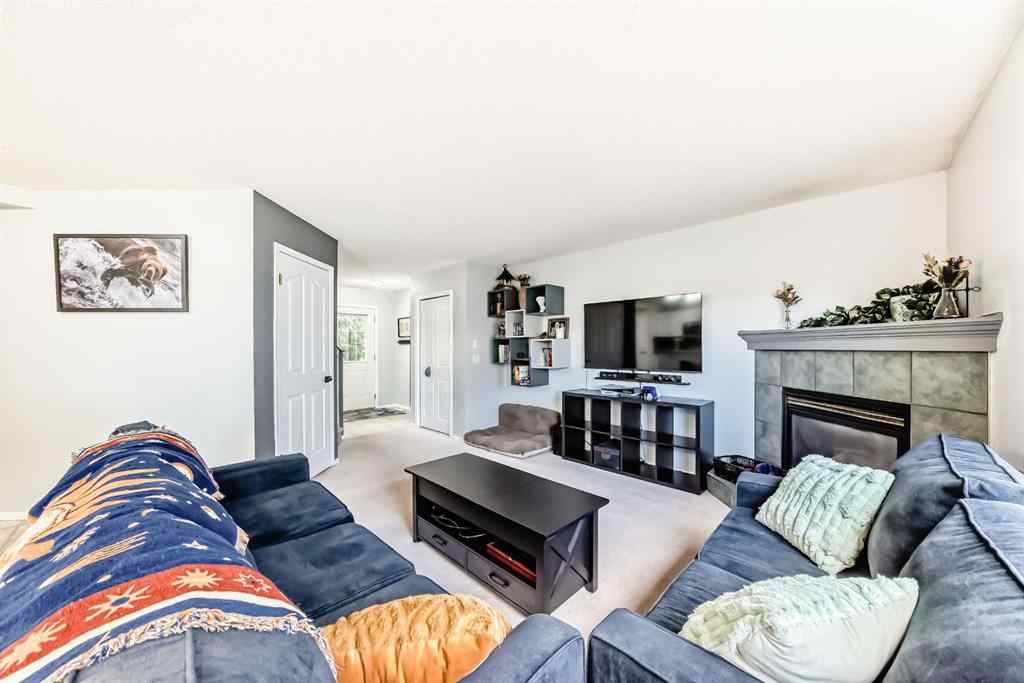 MLS® A2265241 - Unit #8 122 Bow Ridge Crescent  in Bow Ridge Cochrane, Residential