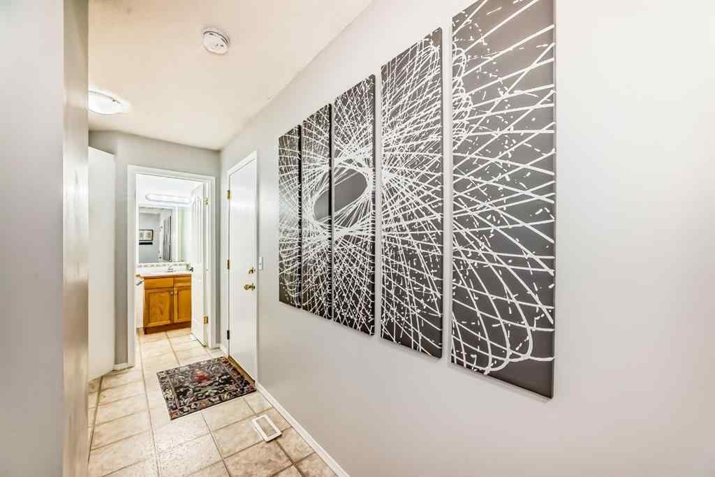 MLS® A2265241 - Unit #8 122 Bow Ridge Crescent  in Bow Ridge Cochrane, Residential