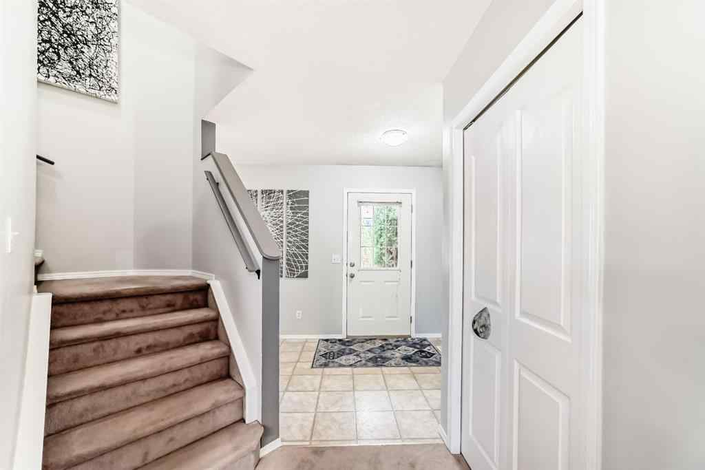 MLS® A2265241 - Unit #8 122 Bow Ridge Crescent  in Bow Ridge Cochrane, Residential