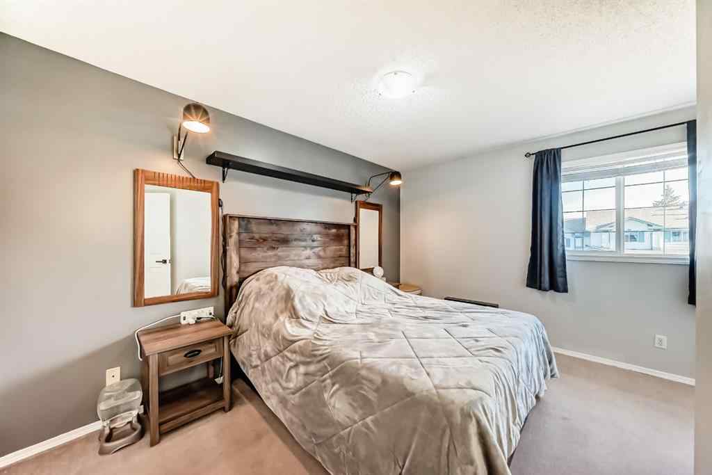MLS® A2265241 - Unit #8 122 Bow Ridge Crescent  in Bow Ridge Cochrane, Residential