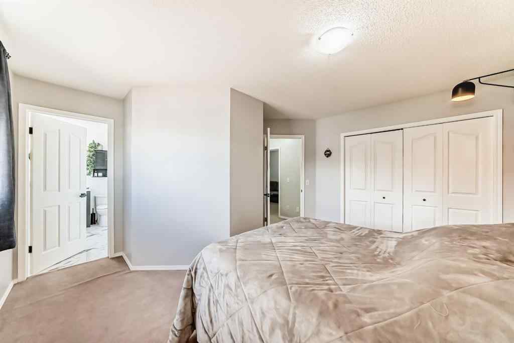 MLS® A2265241 - Unit #8 122 Bow Ridge Crescent  in Bow Ridge Cochrane, Residential
