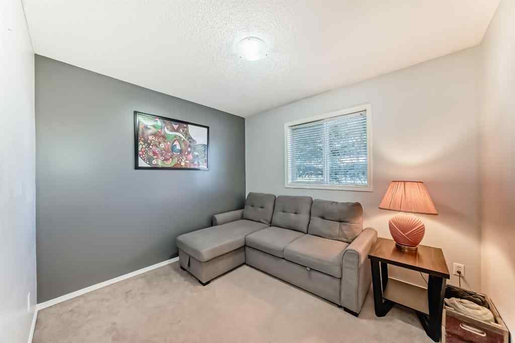 MLS® A2265241 - Unit #8 122 Bow Ridge Crescent  in Bow Ridge Cochrane, Residential