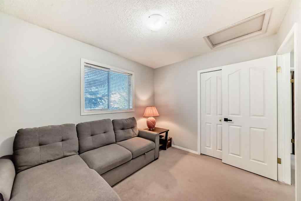 MLS® A2265241 - Unit #8 122 Bow Ridge Crescent  in Bow Ridge Cochrane, Residential