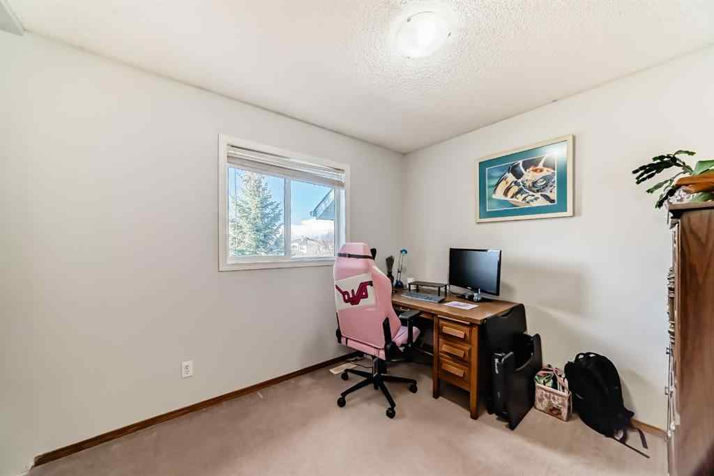 MLS® A2265241 - Unit #8 122 Bow Ridge Crescent  in Bow Ridge Cochrane, Residential