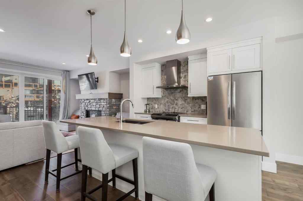MLS® A2265242 - Unit #104A 1101 Three Sisters Parkway  in Three Sisters Canmore, Residential
