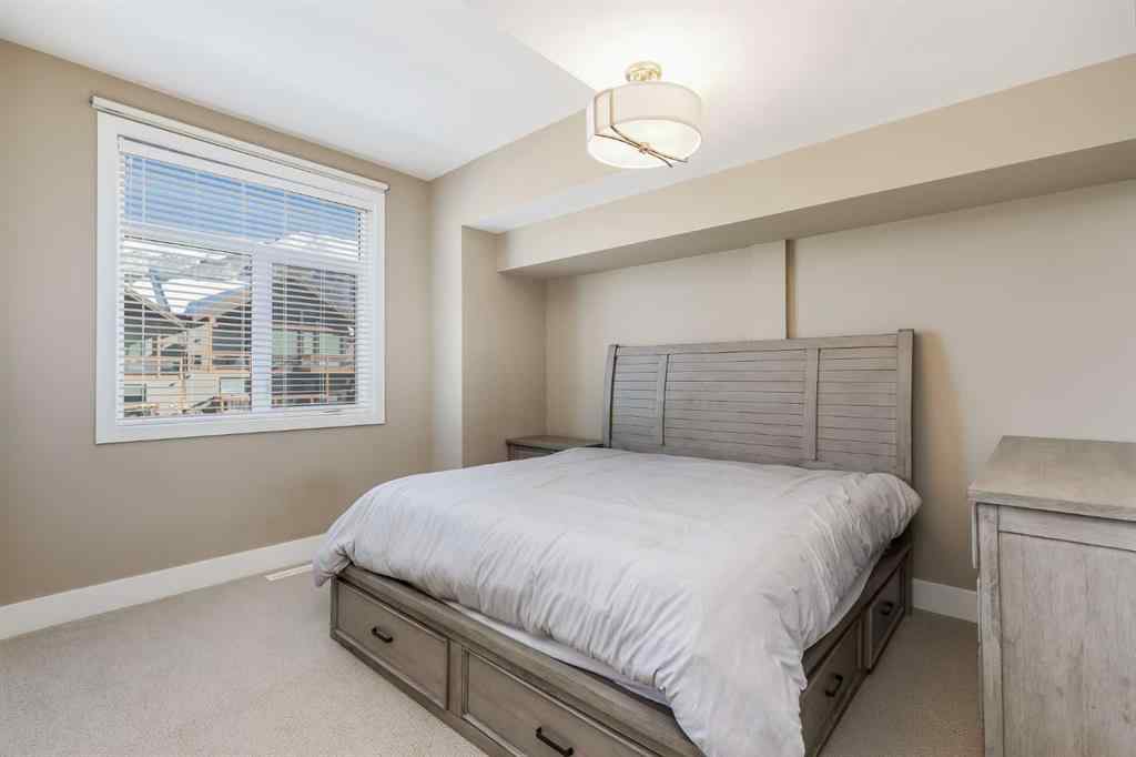 MLS® A2265242 - Unit #104A 1101 Three Sisters Parkway  in Three Sisters Canmore, Residential