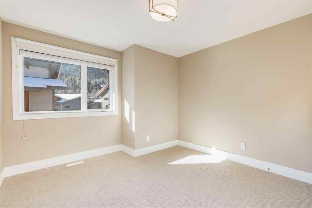 MLS® A2265242 - Unit #104A 1101 Three Sisters Parkway  in Three Sisters Canmore, Residential