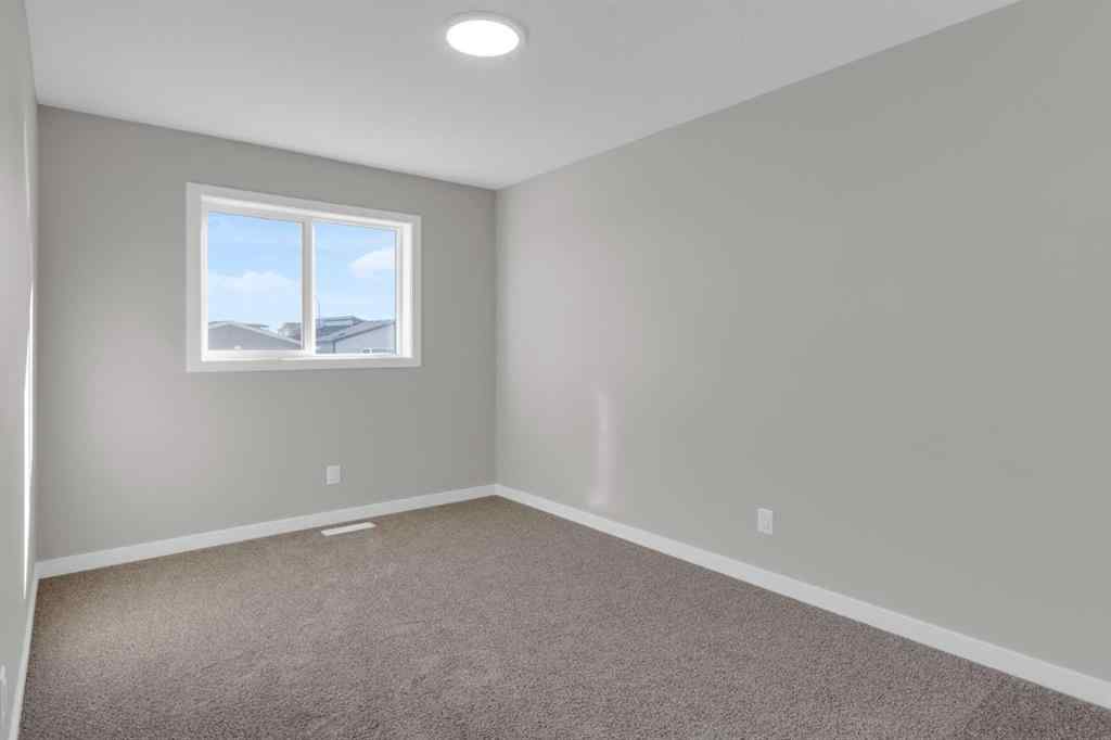 MLS® A2265268 - 873 Livingston View NE in Livingston Calgary, Residential