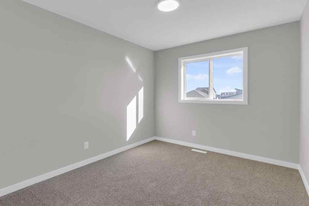 MLS® A2265268 - 873 Livingston View NE in Livingston Calgary, Residential