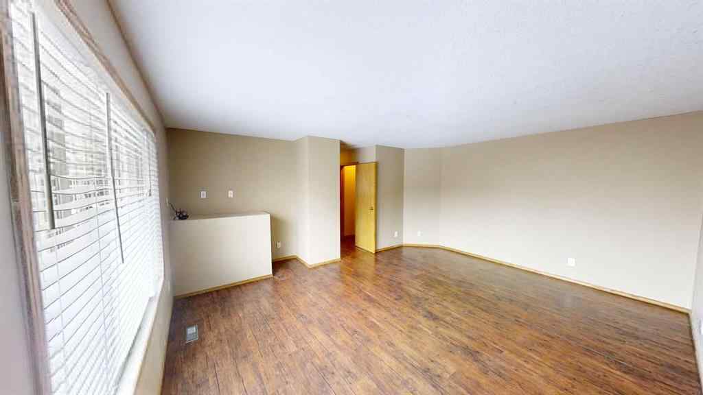 MLS® A2265279 - 9503 103 Avenue  in Hillside Grande Prairie, Multi-Family