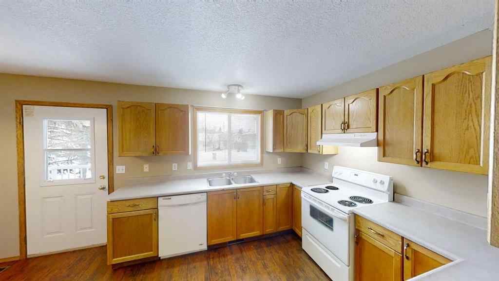 MLS® A2265279 - 9503 103 Avenue  in Hillside Grande Prairie, Multi-Family