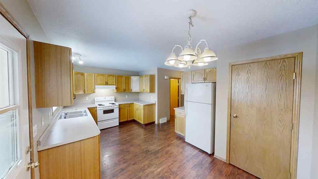 MLS® A2265279 - 9503 103 Avenue  in Hillside Grande Prairie, Multi-Family