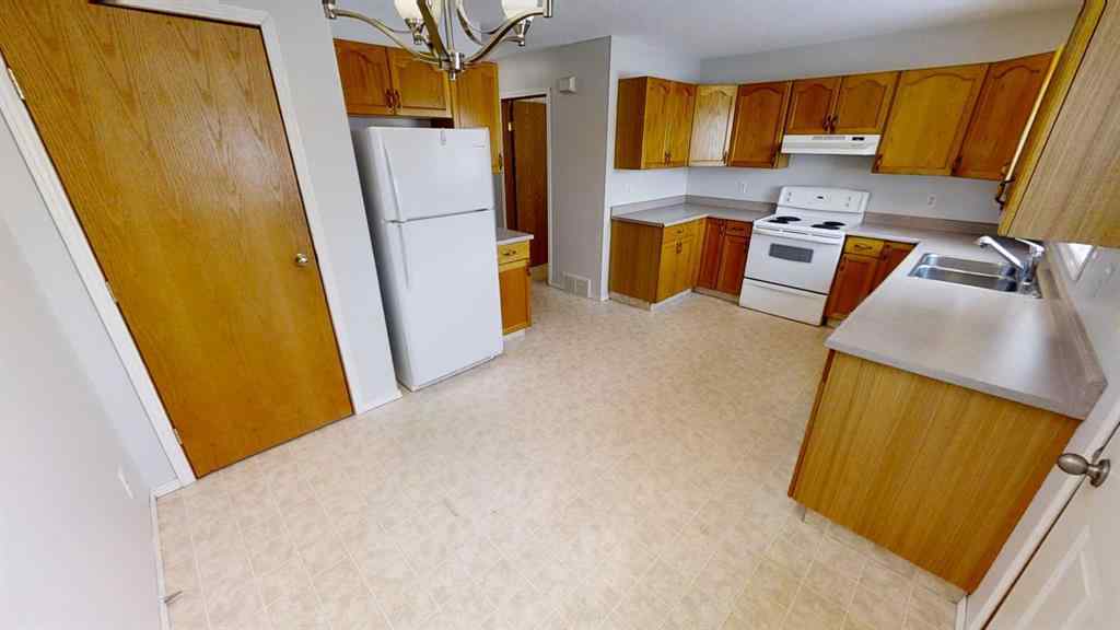 MLS® A2265279 - 9503 103 Avenue  in Hillside Grande Prairie, Multi-Family